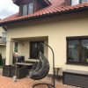 Rattan függő fotel állvánnyal párnával